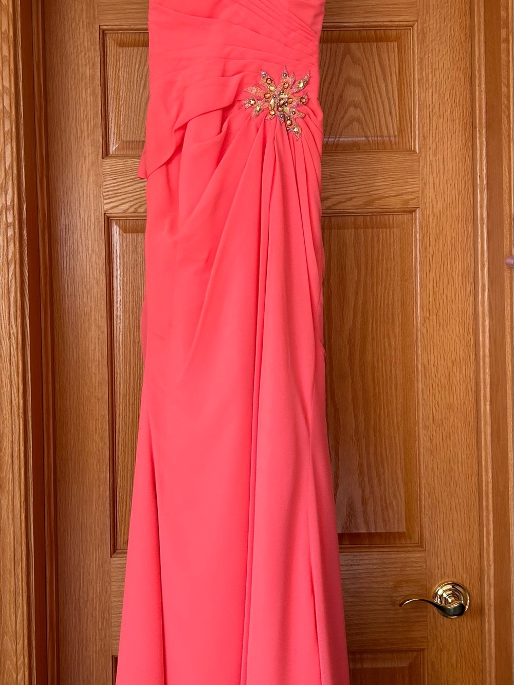 Elegant Coral Evening Gown with Embellished Accent